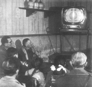 Watching television at the bar in 1950s Italy